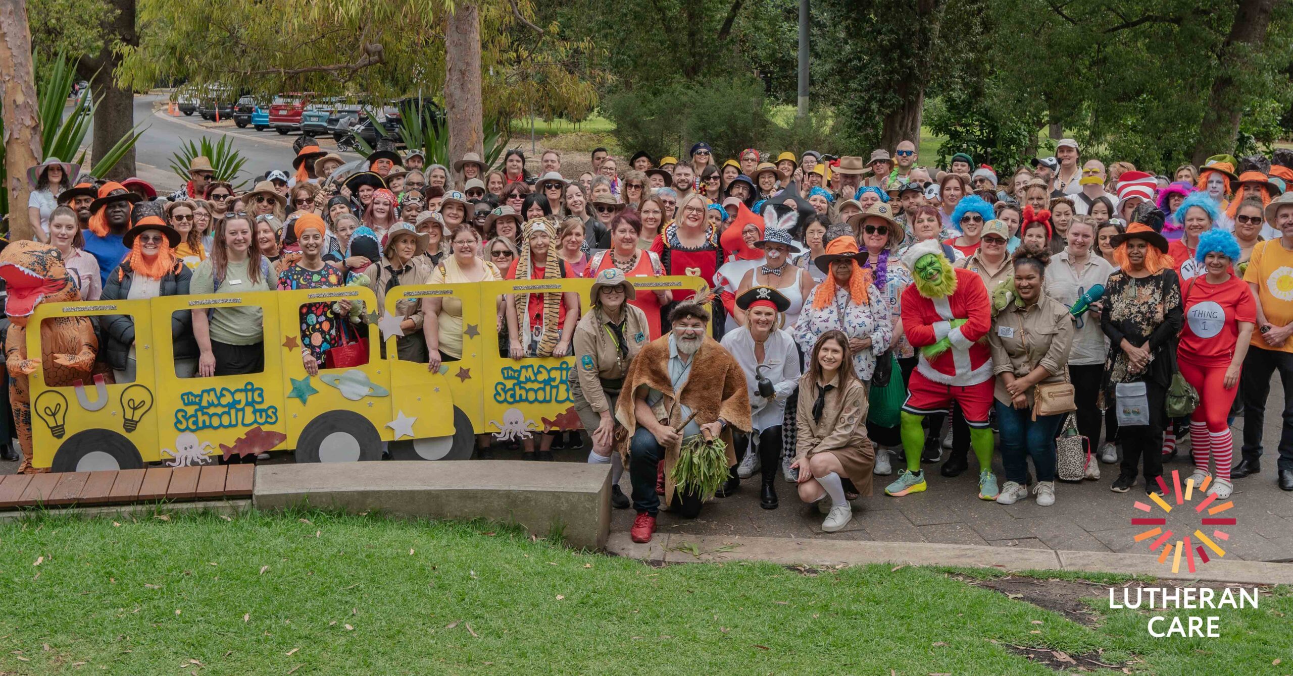 Lutheran Care staff group photo at the 2024 All Staff Day. The Lutheran Care logo appears in the bottom right hand corner.